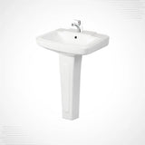 A white ceramic pedestal sink with a chrome faucet, shown against a light gray background with subtle corner stripes.