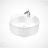 A white round vessel sink with a modern chrome faucet, shown from a high-angle perspective against a light gray background.